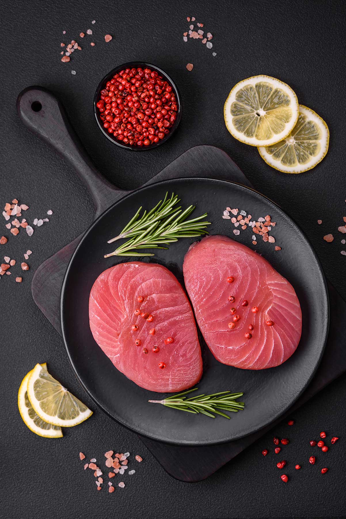 Sliced bluefin tuna seasoned with pink peppercorn and rosemary